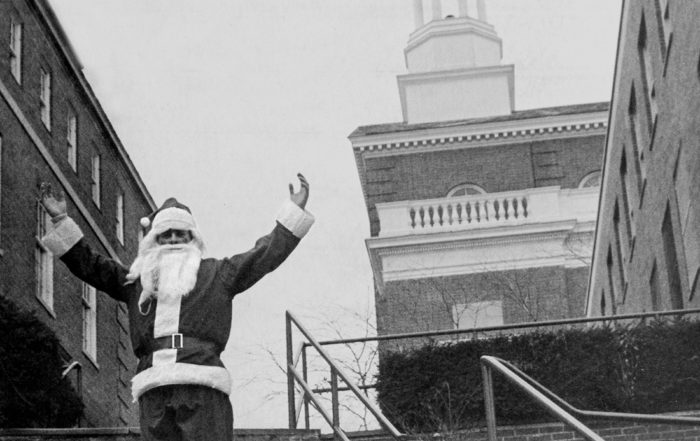 Santa visits Manhattan College in the Bronx in December 1981. While on campus, Mr. Claus distributed presents to administrators and students, dropped in on the President and even shot a few hoops in Draddy gymnasium.